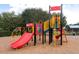Community playground with colorful play structures, slides, and climbing features, perfect for Gathering fun at 637 Jetstar Ln, Oldsmar, FL 34677