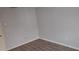Neutral bedroom featuring wood-look flooring and grey paint at 7060 Lafayette St # 7060, Pinellas Park, FL 33781