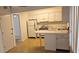 Efficient kitchen with modern appliances and bright countertops, ready for culinary adventures at 7060 Lafayette St # 7060, Pinellas Park, FL 33781
