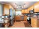 Well-lit kitchen with stainless steel appliances and a large window at 9415 Pebble Glen Ave, Tampa, FL 33647