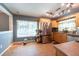 Bright kitchen with stainless steel appliances, ample cabinet space, and tiled floor at 9415 Pebble Glen Ave, Tampa, FL 33647