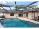 Enjoyable pool with screen enclosure and house at 9415 Pebble Glen Ave, Tampa, FL 33647