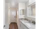 Bathroom featuring a modern vanity with marble countertop and updated fixtures at 10424 Gifford Dr, Spring Hill, FL 34608
