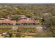 Aerial view of villa community showing a great layout and lush surroundings at 1102 Montrose Pl # 1704, Dunedin, FL 34698