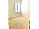 Cozy bedroom with plush carpeting and a window at 11477 Tinder Ct, Venice, FL 34292