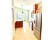 Modern kitchen with stainless steel appliances and an eat-in breakfast area at 11477 Tinder Ct, Venice, FL 34292