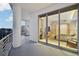 Spacious balcony with city views, comfortable seating, and sliding glass doors leading to the bedroom at 1209 E Cumberland Ave # 2802, Tampa, FL 33602
