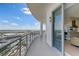 Expansive balcony boasts stunning water views, a sleek railing, and seamless indoor-outdoor living at 1209 E Cumberland Ave # 2802, Tampa, FL 33602