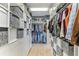 Spacious walk-in closet with custom shelving and storage solutions, offering ample space for organization at 1209 E Cumberland Ave # 2802, Tampa, FL 33602