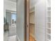 Neat and organized closet with custom shelving, storage, and access to the bedroom at 1209 E Cumberland Ave # 2802, Tampa, FL 33602