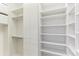 Bright, organized closet with ample shelving, hanging space, and drawers at 1209 E Cumberland Ave # 2802, Tampa, FL 33602