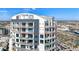 Modern high-rise condo building featuring multiple floors of private balconies at 1209 E Cumberland Ave # 2802, Tampa, FL 33602