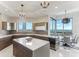 Modern kitchen with stainless steel appliances, spacious island, and panoramic views at 1209 E Cumberland Ave # 2802, Tampa, FL 33602