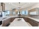 Contemporary kitchen featuring sleek cabinetry, a large island, and abundant counter space at 1209 E Cumberland Ave # 2802, Tampa, FL 33602