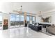 Bright living room boasts floor-to-ceiling windows and panoramic waterfront views at 1209 E Cumberland Ave # 2802, Tampa, FL 33602