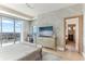 Spacious main bedroom with balcony access and waterfront view at 1209 E Cumberland Ave # 2802, Tampa, FL 33602