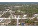 Beautiful aerial view of a community with lush green trees and scattered houses at 12341 Filbert Rd, Weeki Wachee, FL 34614