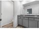 Bright bathroom showcasing double sinks and granite countertops, radiating a fresh, modern appeal at 12341 Filbert Rd, Weeki Wachee, FL 34614
