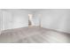 Spacious bedroom with neutral carpet, showcasing a doorway to an adjoining room, and bright, airy feel at 12341 Filbert Rd, Weeki Wachee, FL 34614