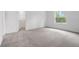 Bright bedroom featuring a window and a walk-in closet, offering ample storage and natural light at 12341 Filbert Rd, Weeki Wachee, FL 34614