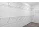 Walk-in closet with wire shelving offering lots of room for organization of clothes, shoes, and accessories at 12341 Filbert Rd, Weeki Wachee, FL 34614