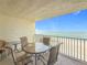 Balcony featuring outdoor seating with views of the beach and ocean at 12924 Gulf Blvd # 503, Madeira Beach, FL 33708