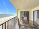 Balcony featuring outdoor seating with direct access to interior bedroom and beach views at 12924 Gulf Blvd # 503, Madeira Beach, FL 33708