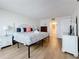 Comfortable bedroom featuring ocean view, dresser, and convenient access to the ensuite bathroom at 12924 Gulf Blvd # 503, Madeira Beach, FL 33708