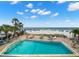 Relax poolside with direct beach access, palm trees, and clear blue skies in this community at 12924 Gulf Blvd # 503, Madeira Beach, FL 33708