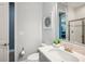 Bright bathroom featuring modern fixtures, granite counter, and tile flooring at 13069 Paddock Wood Pl, Riverview, FL 33579