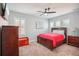 Inviting bedroom with warm tones, soft lighting and ample closet space at 13069 Paddock Wood Pl, Riverview, FL 33579