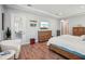 Bedroom features a ceiling design and sliding glass doors to the patio at 13069 Paddock Wood Pl, Riverview, FL 33579