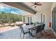 Inviting outdoor patio featuring a dining area and comfortable seating arrangement at 13069 Paddock Wood Pl, Riverview, FL 33579