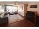 Spacious living room with wood floors, plush seating, and lots of natural light at 1363 Overlea Dr, Dunedin, FL 34698