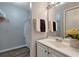 Bright bathroom featuring a white vanity and shower at 1400 Gandy N Blvd # 502, St Petersburg, FL 33702