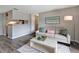 Inviting living room with wood floors, neutral color palette, and a decorative coffee table at 1400 Gandy N Blvd # 502, St Petersburg, FL 33702