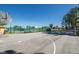 Outdoor basketball court with multiple hoops and surrounding green space at 15702 Muirfield Dr, Odessa, FL 33556