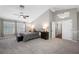 Large main bedroom featuring soaring ceilings and lots of light at 15702 Muirfield Dr, Odessa, FL 33556