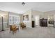 Sitting area in main bedroom with comfortable seating and decor at 15702 Muirfield Dr, Odessa, FL 33556