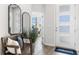 Welcoming foyer with bench seating and views to the outside at 17114 James Trl, Parrish, FL 34219