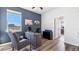 Comfortable home office with a large window and modern wood desk at 17114 James Trl, Parrish, FL 34219