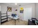 This bedroom features a desk, chair and decor to create a productive and fun office space at 18186 Sandy Pointe Dr, Tampa, FL 33647