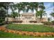 Beautifully landscaped entrance to Heritage Isles Golf & Country Club at 18186 Sandy Pointe Dr, Tampa, FL 33647