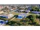 Aerial view of a home with a private backyard swimming pool and partially fenced in yard at 184 Garden Nw Ave, Port Charlotte, FL 33952