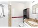 Cozy bathroom featuring tiled shower and granite countertop at 184 Garden Nw Ave, Port Charlotte, FL 33952