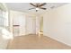 Neutral bedroom with tile floors and a ceiling fan at 184 Garden Nw Ave, Port Charlotte, FL 33952