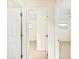 Hallway featuring neutral paint and tile floors at 184 Garden Nw Ave, Port Charlotte, FL 33952