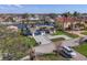 Charming home with lush landscaping, a well-manicured lawn, and an attached garage in a waterfront community at 1984 Kansas Ne Ave, St Petersburg, FL 33703