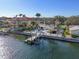Gorgeous waterfront property featuring a private boat dock and refreshing swimming pool, perfect for outdoor living at 1984 Kansas Ne Ave, St Petersburg, FL 33703