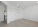 Clean bedroom with laminate floors, closet with sliding doors and water view at 1984 Kansas Ne Ave, St Petersburg, FL 33703